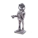 Continental Britannia silver model of a physician with a stethoscope.