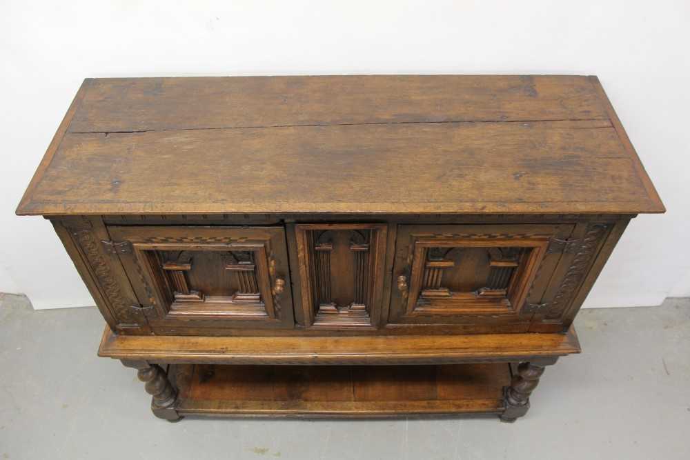 17th century and later oak cupboard on stand with central arched panel flanked by two arched panelle - Image 2 of 4