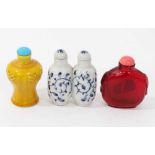 Chinese Peking glass snuff bottle, together with two Chinese porcelain snuff bottles.