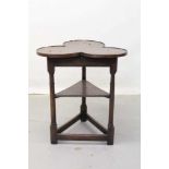 Unusual antique oak cricket table with trefoil top