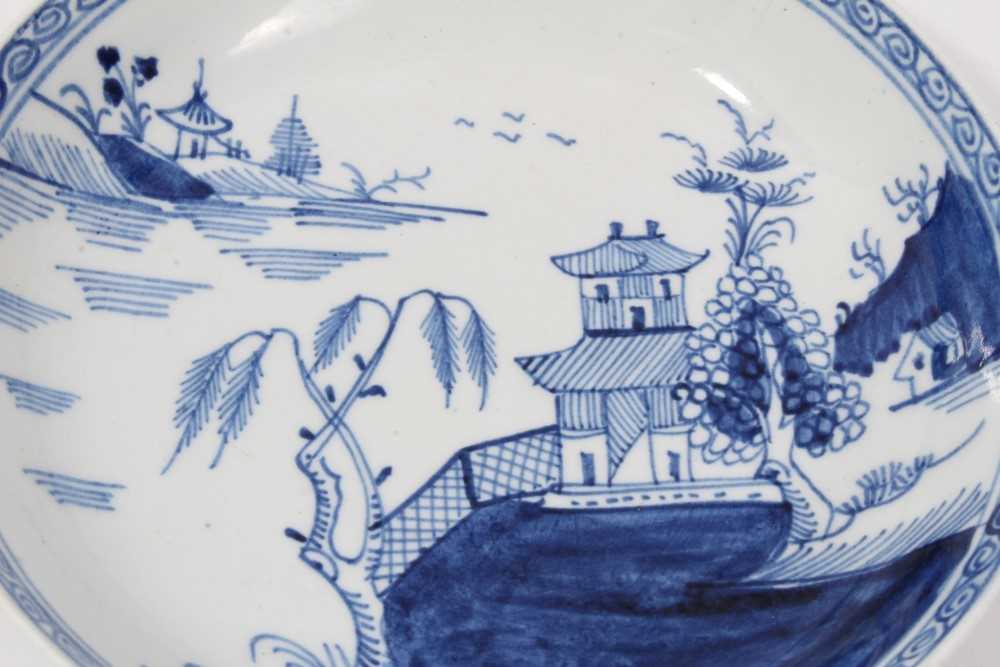 Two similar Lowestoft blue and white saucers, c.1790, painted with Oriental pagoda patterns, ex. Kit - Image 3 of 4