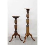 Two 19th century mahogany torchères converted from bedposts on tripod bases