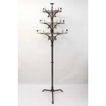 Unusual late 19th/early 20th century floor standing wrought iron candle stand