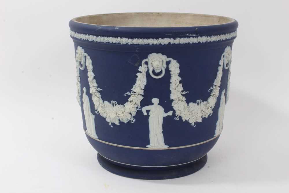 Large antique Wedgwood dark blue jasper ware jardinière, circa 1890, decorated with classical figure