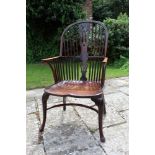 George III fruitwood and elm Windsor elbow chair of generous proportions and good patination, with p