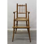 19th century child’s beech high chair with caned seat