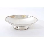 1940s silver dish of circular form with bead border, on a domed circular foot (Sheffield 1945) James