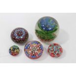Group of five decorative paperweights, early 20th century and later
