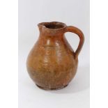 Good 17th century pottery glazed jug
