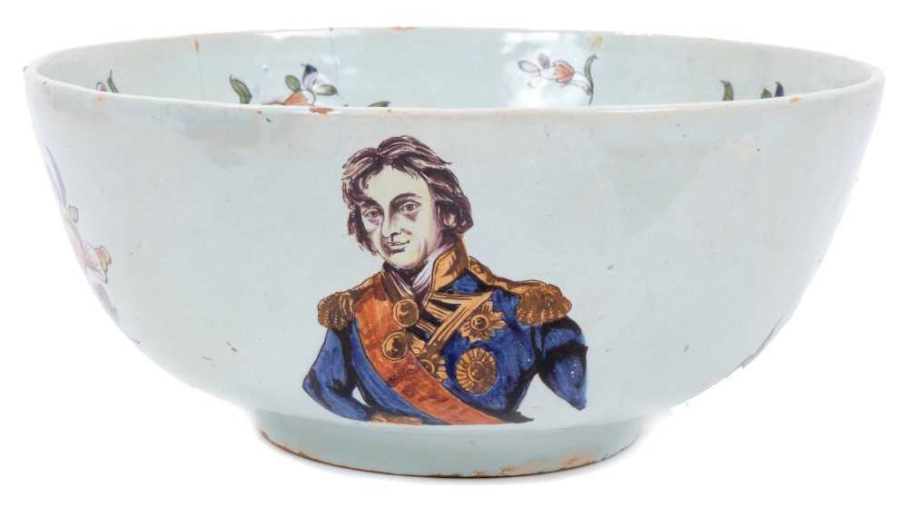 Unusual polychrome Delft ware bowl, commemorating Nelson, with ship and floral decoration, 29cm diam
