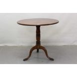 Early 19th century mahogany circular wine table on turned column and tripod base 76cm diameter
