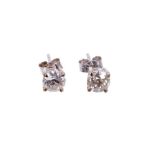 Pair of diamond single stone earrings, each with an old cut diamond in four claw 18ct white gold set