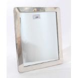 Large Contemporary silver photograph frame of rectangular form with rounded corners.