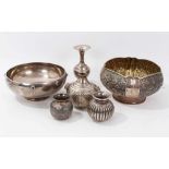 Group of six eastern silver and white metal items to include two bowls and four vases