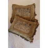 Two velvet cushions utilising early tapestry embroideries