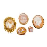 Four antique carved shell cameo brooches and a ring