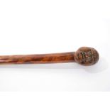 Good early carved hardwood and bamboo walking stick, the wooden terminal carved with figurehead, on