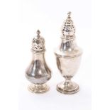 Victorian silver castor of baluster form together with another castor (2)