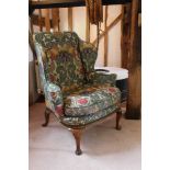 George I and later walnut wing back chair, on cabriole legs with pad feet