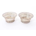 Pair of pierced silver bon bon dishes.