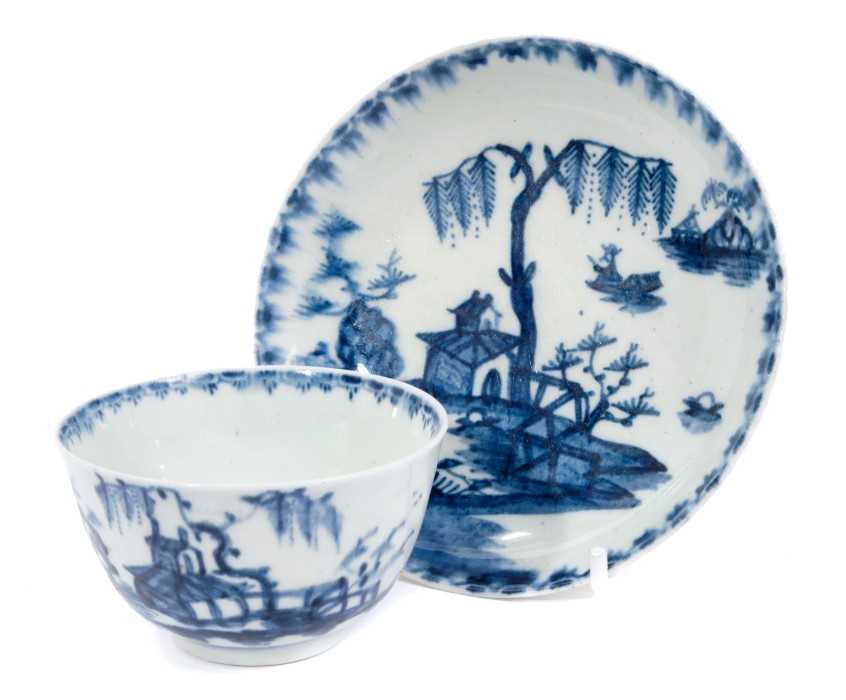 18th century Lowestoft blue and white porcelain tea bowl and saucer, with chinoiserie pattern