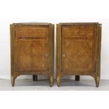 Pair of early 19th century French kingwood and parquetry inlaid corner cupboards