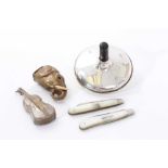 selection of miscellaneous novelty items, including a contemporary silver spinning top.