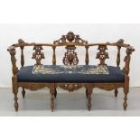 19th century Continental carved twin seater settee