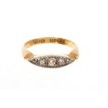 Edwardian diamond five stone ring with a navette shape bezel of old cut diamonds on 18ct gold shank,