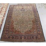 Large antique Kashan tree of life rug, cream ground with central vase of flowers issuing foliage, mu