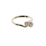 Two stone diamond crossover ring