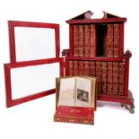 Unusual miniature bookcase, housing set of leather bound volumes