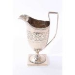 Regency silver milk jug of helmet form