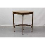 Edwardian inlaid mahogany two tier occasional table with carved capitals, taper legs on splayed feet