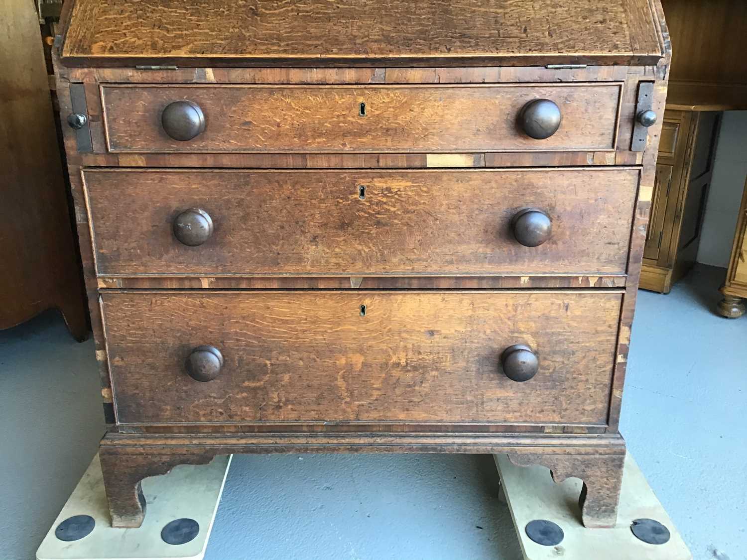 19th century oak bureau with fitted interior above three drawers on bracket feet H106.5cm W90cm D48. - Image 5 of 6