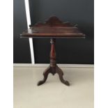 Mahogany side table on turned column with splayed tripod base H87cm W68 D41cm