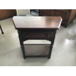 Oak hall table and an oak bookcase enclosed by two glazed doors