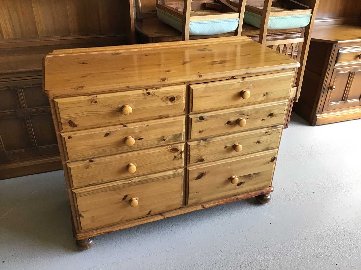 Ducal pine chest of eight drawers on turned feet