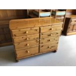 Ducal pine chest of eight drawers on turned feet
