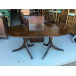 Two reproduction mahogany D-end dining table both with an extra leaf