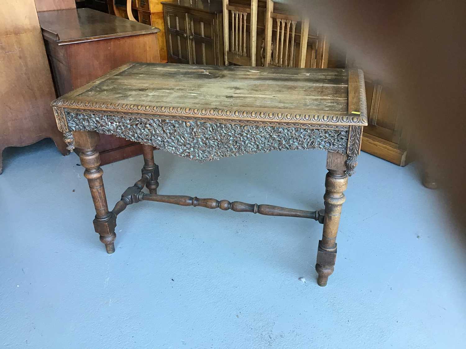 19th century carved oak hall table on turned legs joined by stretcher H72cm W107cm D58cm