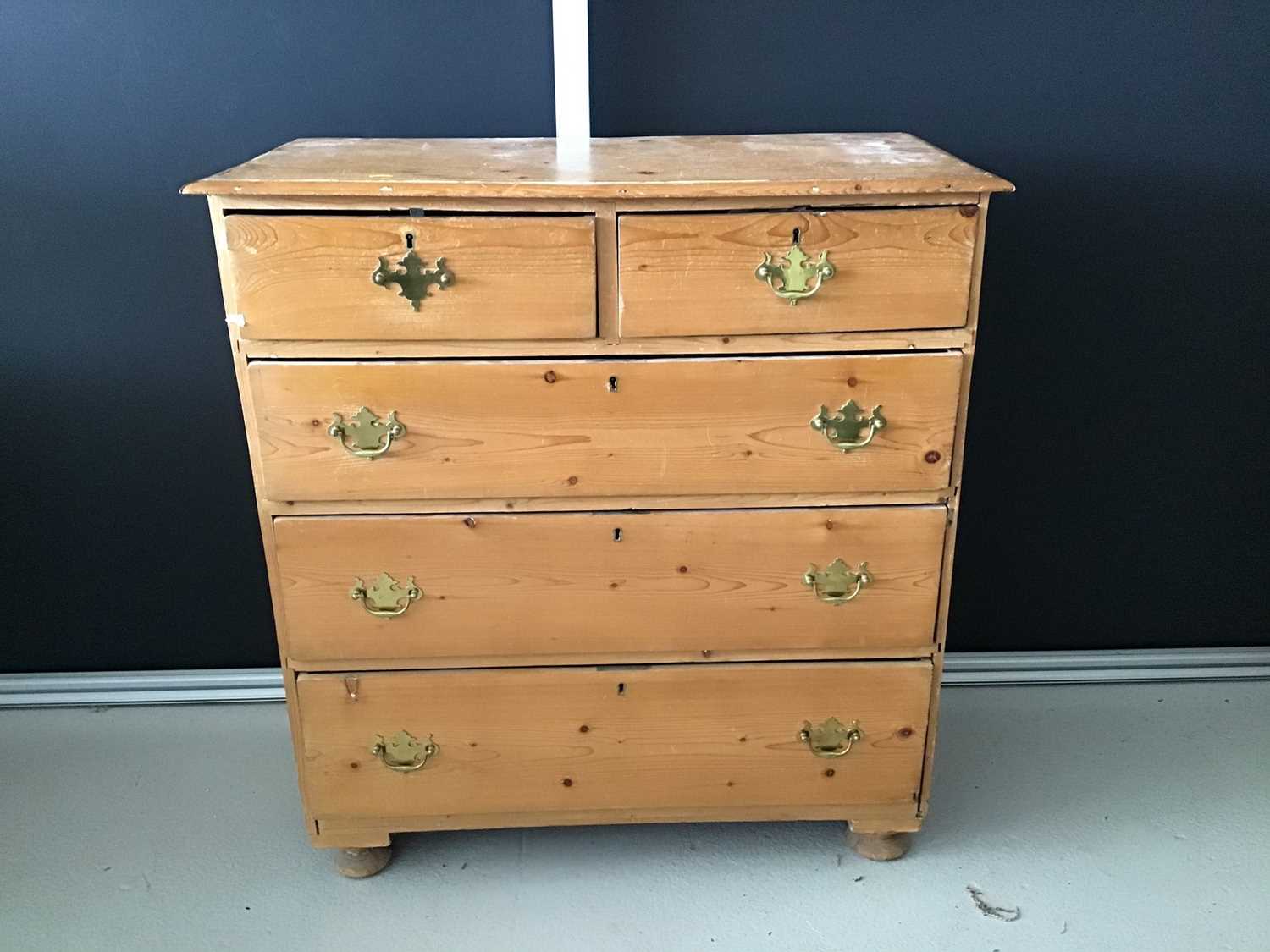 Antique pine chest of two short and three long drawers on turned feet H95cm W88cm D43cm