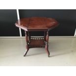 Edwardian mahogany octagonal table with turned supports joined by undertier on splayed legs H74cm