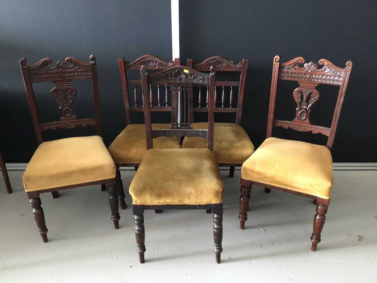 Matched set of five Edwardian mahogany dining chairs with gold upholstered seats on turned legs