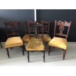Matched set of five Edwardian mahogany dining chairs with gold upholstered seats on turned legs