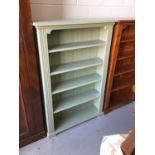 Contemporary painted open bookcase with panelled back, four fixed shelves on bracket feet H144.5cm W