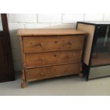 Continental old pine chest of three drawers with bun handles on shaped carved feet H81cm W104cm