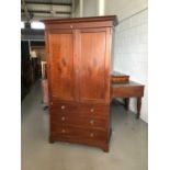 Mahogany inlaid wardrobe with two panelled doors above enclosing hanging rail two short and two long