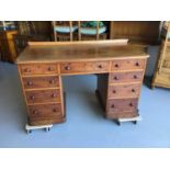 Victorian mahogany kneehole desk with an arrangement of nine drawers below H70cm W130cm D60.5cm