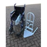 Folding wheelchair and a bed aid